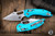 Microtech Stitch Ram-Lok Manual Folder Turquoise Fluted Aluminum 3.75" M390 Stonewash Serrated 169RL-10FLTQ