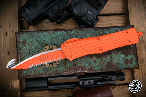 Preowned-Microtech Combat Troodon Rescue OTF Knife Orange Frag 3.8" Orange Serrated 601-3CORHS